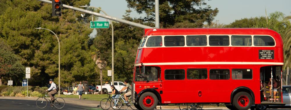 A bus and bicycles sharing the road.
