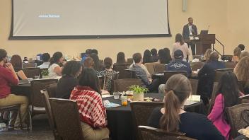 Dr. Denzil Streete presents the morning keynote at AGS23. 