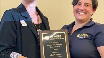 Alyssa Parsons receives the Outstanding GPC Award from Nicole Rabaud